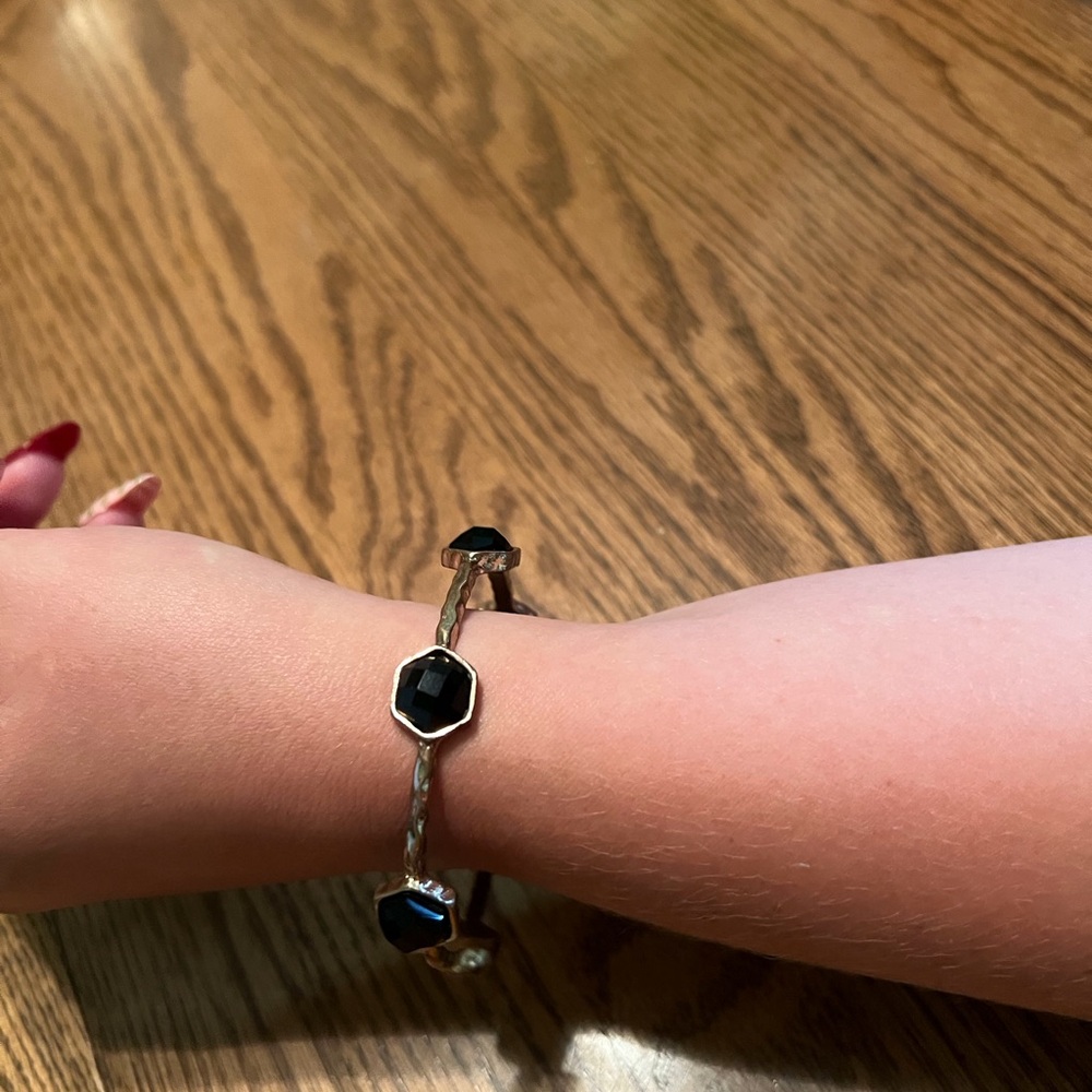 Gold Bracelet with Black Gem Accents
